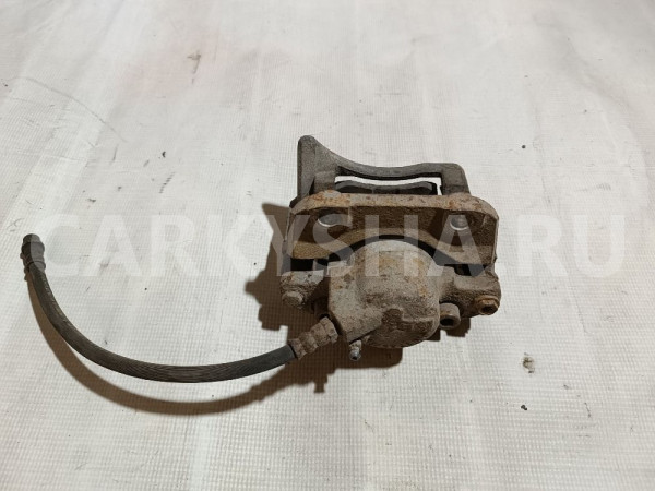 Суппорт тормозной передний правый Renault Duster оригинальный номер 7701207959