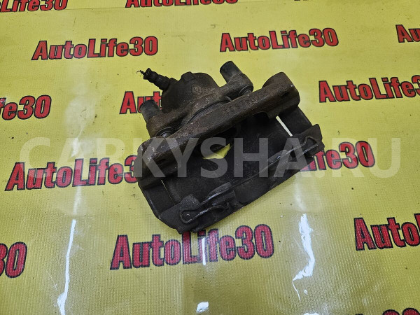 Суппорт тормозной передний левый Renault Duster оригинальный номер 402014636R